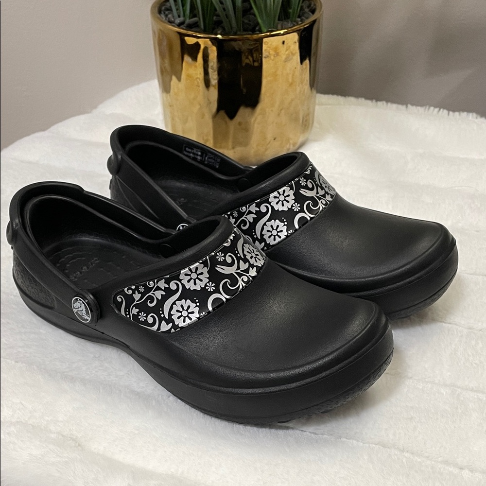 Sold❤️CROCS Black and White Floral Clogs